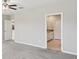 Spacious main bedroom leading to en-suite bathroom at 248 Argyll Dr, Spring Hill, FL 34609