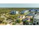 An aerial view of a waterfront community with access to the Gulf at 3006 Christophers Watch Ln, Ruskin, FL 33570