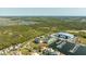 Lovely waterfront property with private marina access, beautiful landscaping, and expansive views of the estuary beyond at 3006 Christophers Watch Ln, Ruskin, FL 33570
