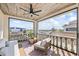 Stylish balcony with comfortable seating, wood ceiling, and views of the marina at 3006 Christophers Watch Ln, Ruskin, FL 33570