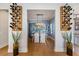 Elegant dining room with wine racks, a stylish chandelier, and a clear view to the outdoors at 3006 Christophers Watch Ln, Ruskin, FL 33570