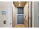 Interior view of the home elevator featuring safety features and modern design at 3006 Christophers Watch Ln, Ruskin, FL 33570
