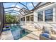 Beautiful house with screened in pool area, lush landscaping and water views at 3006 Christophers Watch Ln, Ruskin, FL 33570