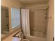 Bathroom features a bathtub and shower combination at 3292 Dow Ln, Spring Hill, FL 34609