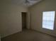 Bedroom features a closet, a window, and carpeted floors at 3292 Dow Ln, Spring Hill, FL 34609