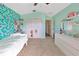 Spacious bedroom featuring mermaid scale accent wall, closet, and bright natural light at 3412 Trapnell Ridge Dr, Plant City, FL 33567
