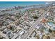 Stunning aerial view of the coastal community with a vibrant mix of residential and commercial properties near the intercoastal waterway at 427 79Th Ave, St Pete Beach, FL 33706