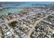 Beautiful aerial showcasing the property's proximity to the bay and surrounding neighborhood with mature landscaping and nearby amenities at 427 79Th Ave, St Pete Beach, FL 33706