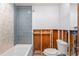 Bathroom featuring a white tub and blue subway tile at 427 79Th Ave, St Pete Beach, FL 33706