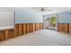 Bedroom featuring unfinished walls and sliding glass door at 427 79Th Ave, St Pete Beach, FL 33706