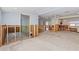 Renovation project displaying the open-concept layout with exposed framework and partial kitchen view at 427 79Th Ave, St Pete Beach, FL 33706
