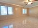 Bedroom featuring natural light through two windows and tiled floors at 514 Brandon Ave, Clearwater, FL 33765