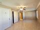 Spacious bedroom featuring tiled flooring and access to the hallway at 514 Brandon Ave, Clearwater, FL 33765