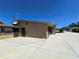 The home features a concrete patio leading to a two-car garage at 514 Brandon Ave, Clearwater, FL 33765