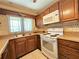 Kitchen sink with stainless steel appliances, updated cabinetry, and a double basin sink at 514 Brandon Ave, Clearwater, FL 33765