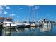 Beautiful marina view featuring sailboats and yachts docked in clear blue water under a sunny sky at 514 Brandon Ave, Clearwater, FL 33765