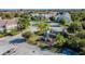 Aerial view of a neighborhood playground with modern equipment, set in a Gathering-friendly community with palm trees at 6447 Cypressdale Dr # 202, Riverview, FL 33578