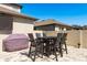 A beautiful patio with a grill and an outdoor dining table at 8766 Capstone Ranch Dr, New Port Richey, FL 34655