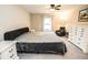 Serene bedroom featuring plush carpeting, neutral colors, and lots of natural light at 17113 Sunshine Mimosa St, Wimauma, FL 33598