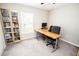 Office space with desk, chair, and bookshelf at 17113 Sunshine Mimosa St, Wimauma, FL 33598