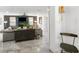 Stylish living room with modern decor, a fireplace and a flat screen TV at 1110 S Pine Lake Dr, Tampa, FL 33612