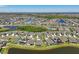 Community aerial view showcasing a Primary planned community featuring a lake at 13822 Carlow Park Dr, Riverview, FL 33579