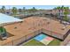 View of the community playground with swings, shade structure, and picnic tables at 13822 Carlow Park Dr, Riverview, FL 33579