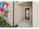 This home boasts a beautiful front door, complemented by attractive landscaping and exterior design at 13822 Carlow Park Dr, Riverview, FL 33579