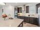 Charming kitchen featuring modern appliances, ample counter space, and stylish finishes for a delightful cooking experience at 13822 Carlow Park Dr, Riverview, FL 33579