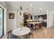Beautiful kitchen featuring a large center island, pendant lighting, modern appliances, and dining nook with plenty of natural light at 13822 Carlow Park Dr, Riverview, FL 33579