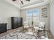 Relaxing sitting area in the main bedroom with natural light and neutral decor at 13822 Carlow Park Dr, Riverview, FL 33579