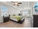 Spacious main bedroom with a trey ceiling, tile floors, and large windows at 13822 Carlow Park Dr, Riverview, FL 33579