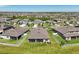 Home features a screen enclosed lanai for outdoor living and entertaining with lake views at 13822 Carlow Park Dr, Riverview, FL 33579