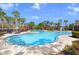 Inviting community pool with clear blue water and ample deck space at 15414 Fire Rock Pl, Ruskin, FL 33573