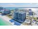 Breathtaking aerial view of a beachfront condominium with a pool and stunning ocean views at 1600 Gulf Blvd # 817, Clearwater Beach, FL 33767