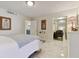 Cozy bedroom boasts sleek flooring, neutral tones, and tranquil ensuite access at 1600 Gulf Blvd # 817, Clearwater Beach, FL 33767