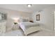 Inviting bedroom with marble floors, white furniture and bright natural light at 1600 Gulf Blvd # 817, Clearwater Beach, FL 33767