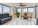 Bright dining area includes ceiling fan and panoramic city views at 1600 Gulf Blvd # 817, Clearwater Beach, FL 33767