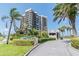 Luxurious beachfront condo with lush landscaping and prominent signage at 1600 Gulf Blvd # 817, Clearwater Beach, FL 33767