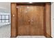 Elegant double door entrance to unit 817, featuring rich wood and sophisticated hardware at 1600 Gulf Blvd # 817, Clearwater Beach, FL 33767