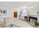 Spacious condo living room featuring marble floors and plenty of natural light at 1600 Gulf Blvd # 817, Clearwater Beach, FL 33767