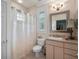 Bright bathroom featuring shower with white shower curtain and white vanity at 16211 Villarreal De Avila, Tampa, FL 33613
