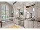 Luxurious bathroom featuring a soaking tub, dual vanities, and a makeup vanity at 16211 Villarreal De Avila, Tampa, FL 33613