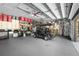 A spacious garage equipped with storage cabinets, a golf cart, and bike racks at 16211 Villarreal De Avila, Tampa, FL 33613