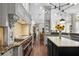 Bright and spacious kitchen with a long island, modern appliances, and plenty of cabinet space at 16211 Villarreal De Avila, Tampa, FL 33613