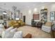 Inviting living room area featuring stylish seating and curated decor at 16211 Villarreal De Avila, Tampa, FL 33613