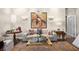 Cozy living room with stylish furnishings, a plush sofa, and eye-catching artwork on the walls at 16211 Villarreal De Avila, Tampa, FL 33613