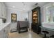 Functional mud room with white cabinets, a utility sink, and ample storage at 16211 Villarreal De Avila, Tampa, FL 33613