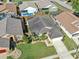 Aerial view of a home with a manicured lawn and mature trees at 1730 Westerly Dr, Brandon, FL 33511