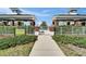 Inviting entrance to the recreation center with well-manicured landscaping and clear signage at 1806 Lake George Cv, Bradenton, FL 34211